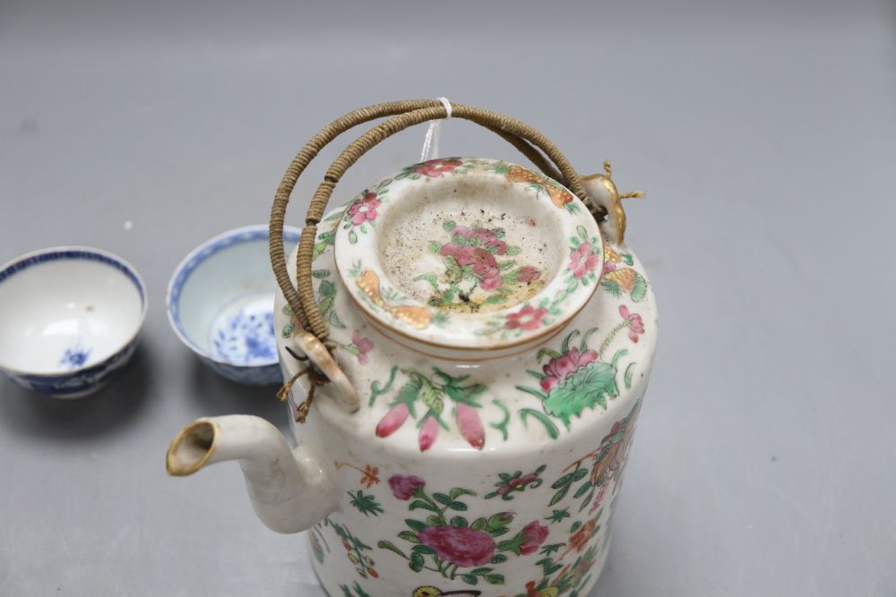 A Chinese famille rose teapot, height 15cm and two blue and white teabowls